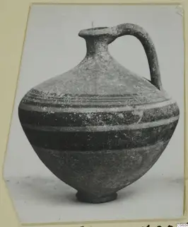 One-handled Bichrome-Red pottery jug with dark horizontal bands, from Marion
