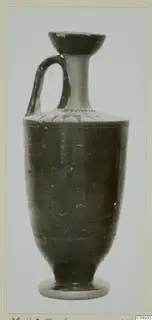 Black glazed pottery vessel with a single handle, flared mouth and ring foot, from Marion