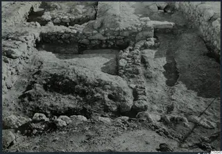 Excavated stone walls and rubble at the palace at Vouni