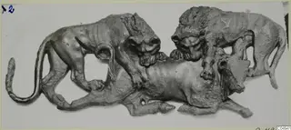 Bronze relief of two lions attacking a recumbent animal, from Vouni