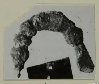 Corroded bronze loop from Amathus, part of a personal adornment
