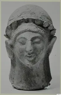 Terracotta head with a band of rounded knobs across the top of the head, from Mersinaki