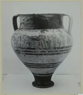 Two-handled painted pottery vessel with a wide mouth and a footed base, shown against a plain grey background.
