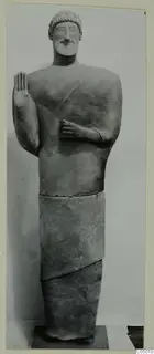 Life-size terracotta statue of a bearded man raising his right hand, from Mersinaki.
