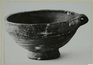 Base-Ring Ware cup from Enkomi with a single horizontal handle, seen from the side