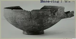 Pottery Base-Ring Ware bowl from Enkomi, broken, with a stub of handle on the right side