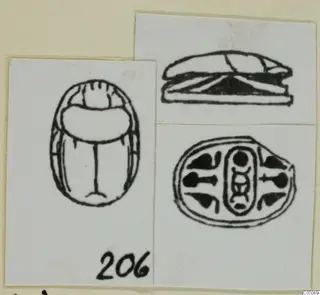 Drawings of a scarab-shaped seal from Ayia Irini in three views: back, side and base, with a number label