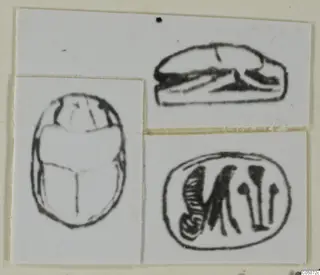 Ink drawings of three seals: two scarabs, one seen from above and one from the side, and an oval seal with carved signs