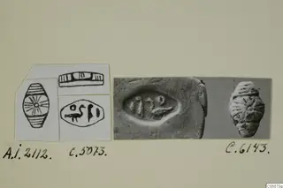 Drawings and photographs of seals and gems from Ayia Irini, mounted on a card
