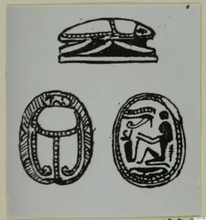 Line drawing of a scarab in three views: side profile, back, and an incised base with a seated figure and an eye motif.