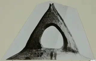 Pottery handle fragment, White Slip Ware, with a wide oval opening and a handwritten number label on its base