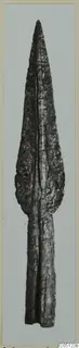 Spearhead of bronze from Amathus, shown upright against a plain grey background