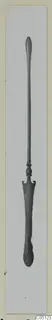 Bronze toilet implement from Amathus: a long slender shaft with a flattened, notched spatula end