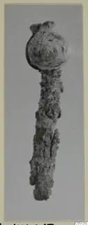 Corroded iron pin with a rounded head, from the Kastros tombs at Lapithos