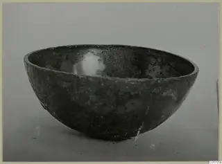 Bowl from the Kastros tombs at Lapithos, seen from the side against a plain grey background