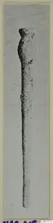 Bone pin from Lapithos, Kastros tombs, shown upright against a pale background