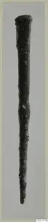 Long slender bronze tool tapering to a point, from Ayios Iakovos
