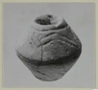Small rounded object with a wide opening at the top and raised ridges around its body, from Ayios Iakovos.