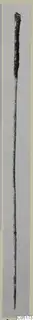 Long slender metal object with a thicker rounded top tapering to a point, shown upright on a grey background