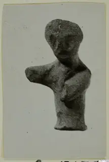 Terracotta figurine of a human figure, Minor Plastic 3, with one arm stretched out to the side
