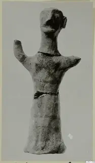 Terracotta figurine of a standing figure with one arm raised, from Ayios Iakovos