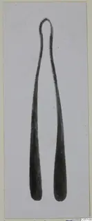 Single metal object with a looped top and two long tapering arms, from Lapithos Tomb 302A.