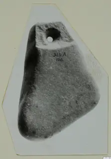 Worked stone object with a drilled hole in its flat top, from Lapithos Tomb 313 A