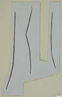 Pale paper cut-out with a notch in one side and three dark lines, on a cream card