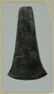 Bronze tool from Lapithos Tomb 315 A: a flat blade that widens to a broad, curved cutting edge