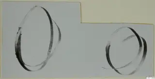 Two ring-shaped objects from Lapithos Tomb 313 A, shown on a pale card.