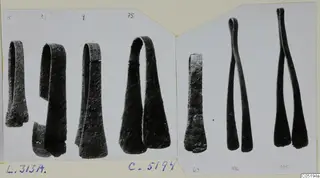 Photo mount of bronze tongs from Lapithos Tomb 313 A, with numbered objects on two cards