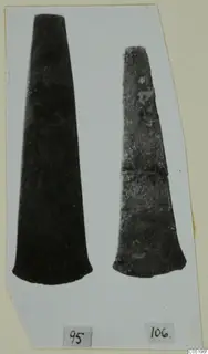 Two tapering metal objects from Lapithos Tomb 313 B, shown side by side