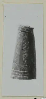 Tapering decorated object from Enkomi Tomb 3, shown in a mounted print