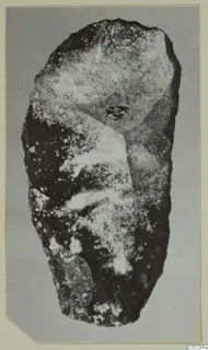 Stone scraper from Kythrea, elongated with pale speckled patches on its surface