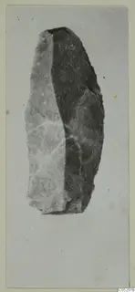 Stone knife from Kythrea, photographed on a pale background.
