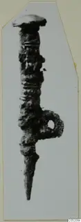 Corroded metal pin with a ring-shaped loop on its shaft, from Enkomi Tomb 3