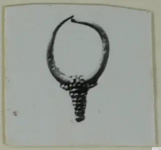 Ring-shaped piece of jewellery with a granulated cone at its base, from Enkomi Tomb 3