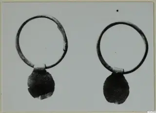 Two ring-shaped jewellery pieces with rounded pendants, from Enkomi, Tomb 3