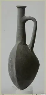 Pottery vessel with a tall neck, flared rim and single loop handle, from Enkomi