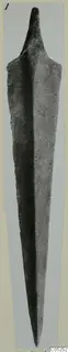 Long metal blade with a tapering point and short tang, from Lapithos