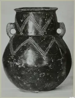 Round-bodied jug with two loop handles and white painted zigzag bands on a dark polished surface