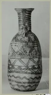 White Painted III-2 bottle from Lapithos, finds from the Vrysi tou Barba tombs, shown in a photograph