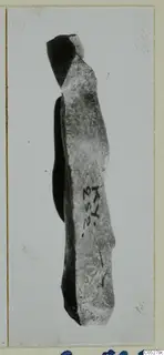Elongated stone fragment from Kythrea, broken at the top, with a handwritten number label on its side.
