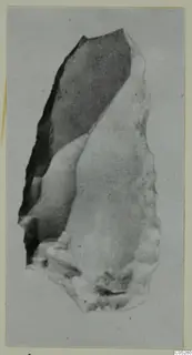 Elongated worked stone object from Kythrea, tapering towards the upper end.