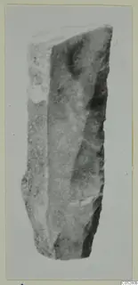 Stone knife from Kythrea, shown upright against a plain grey background