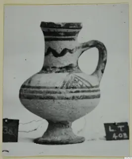 White Painted II jug with a loop handle and dark painted bands, from Lapithos