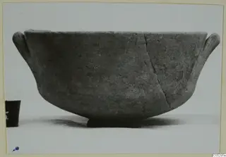Pottery bowl with two small handles and a low foot, from Lapithos, Kastros tombs.