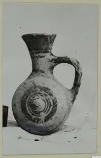 Pottery Bichrome III jug from Lapithos, Kastros tombs, with concentric painted circles on its body