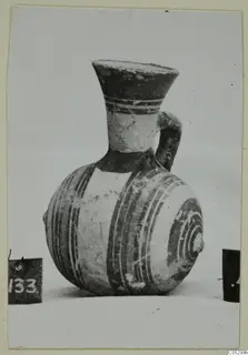 Pottery Bichrome III juglet from Lapithos, Kastros tombs, with painted bands on a pale body