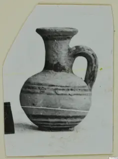 Pottery White Painted II jug from the Kastros tombs at Lapithos, shown in a photograph